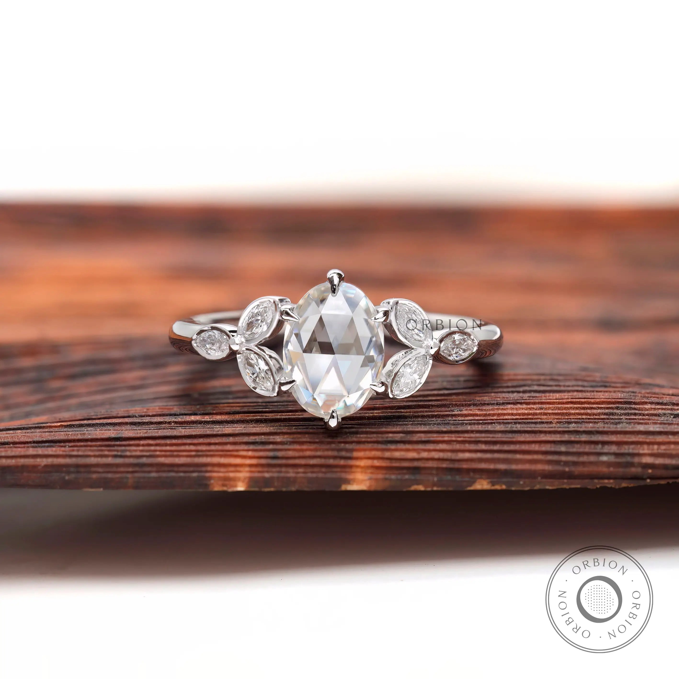 Front view oval rose cut moissanite cluster ring