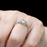 On hand view oval moissanite cluster ring