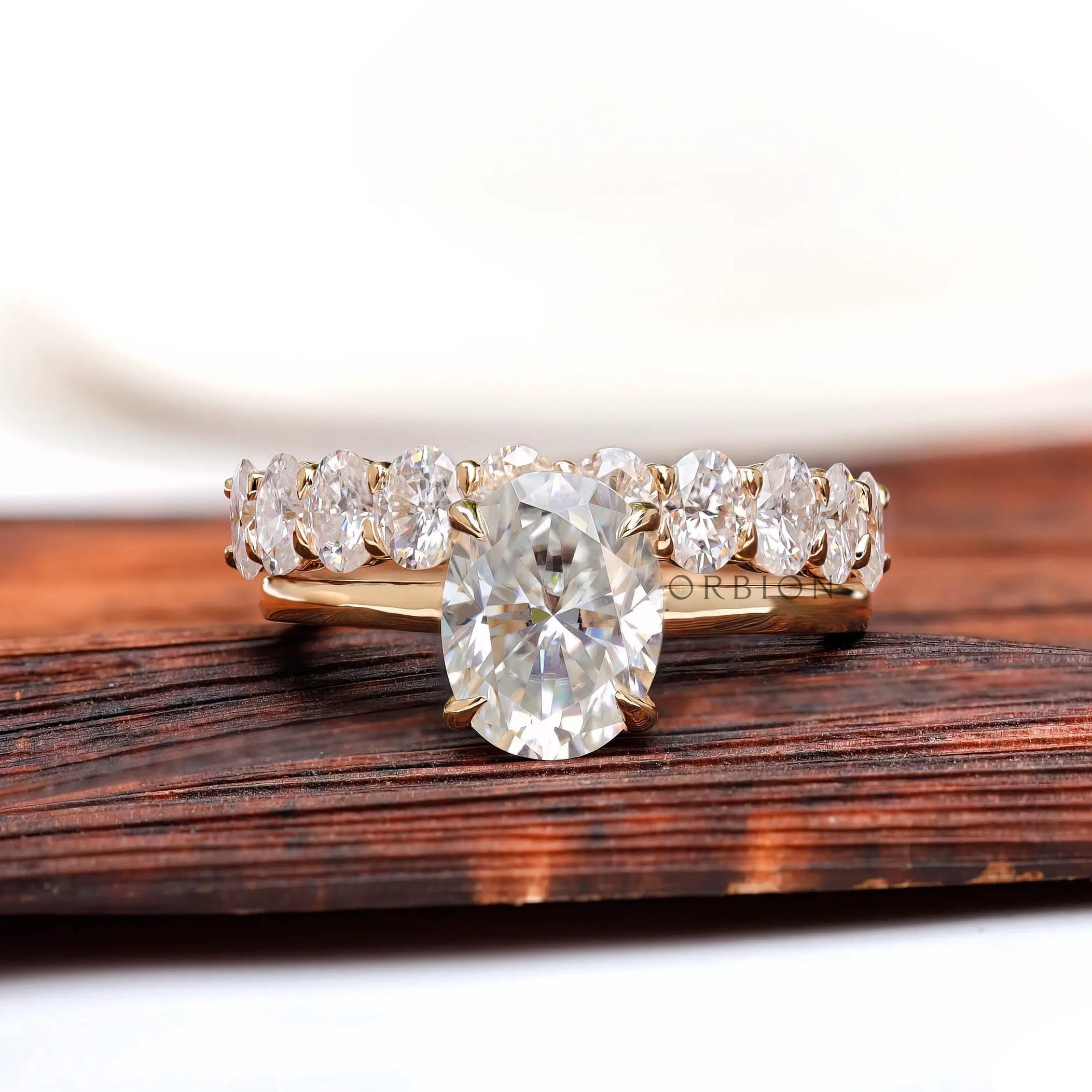 Angled view highlighting elevated solitaire and stack band