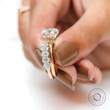 Side on-hand view highlighting prong setting and band