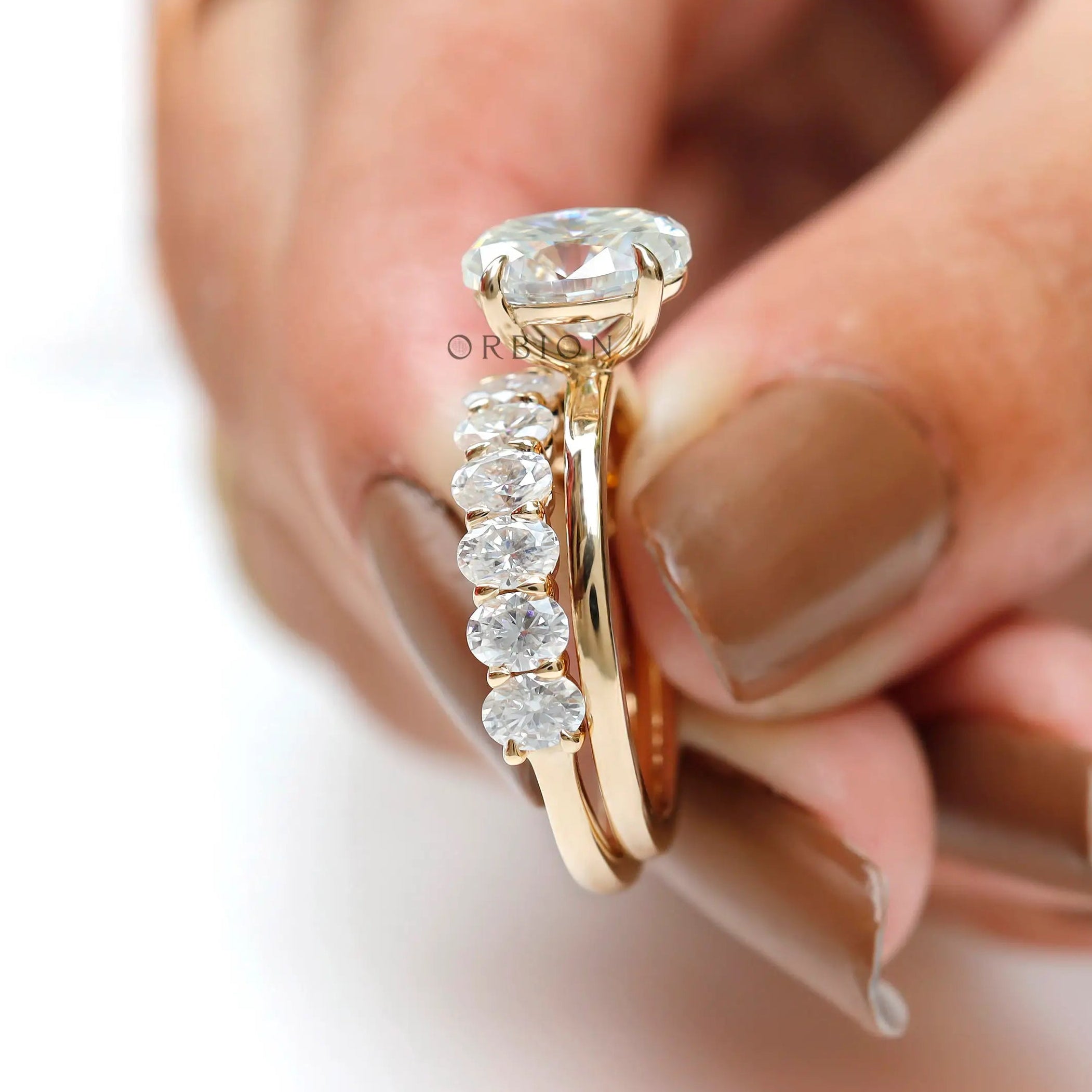 Side on-hand view highlighting prong setting and band