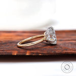 Side profile view showing hidden halo beneath center stone