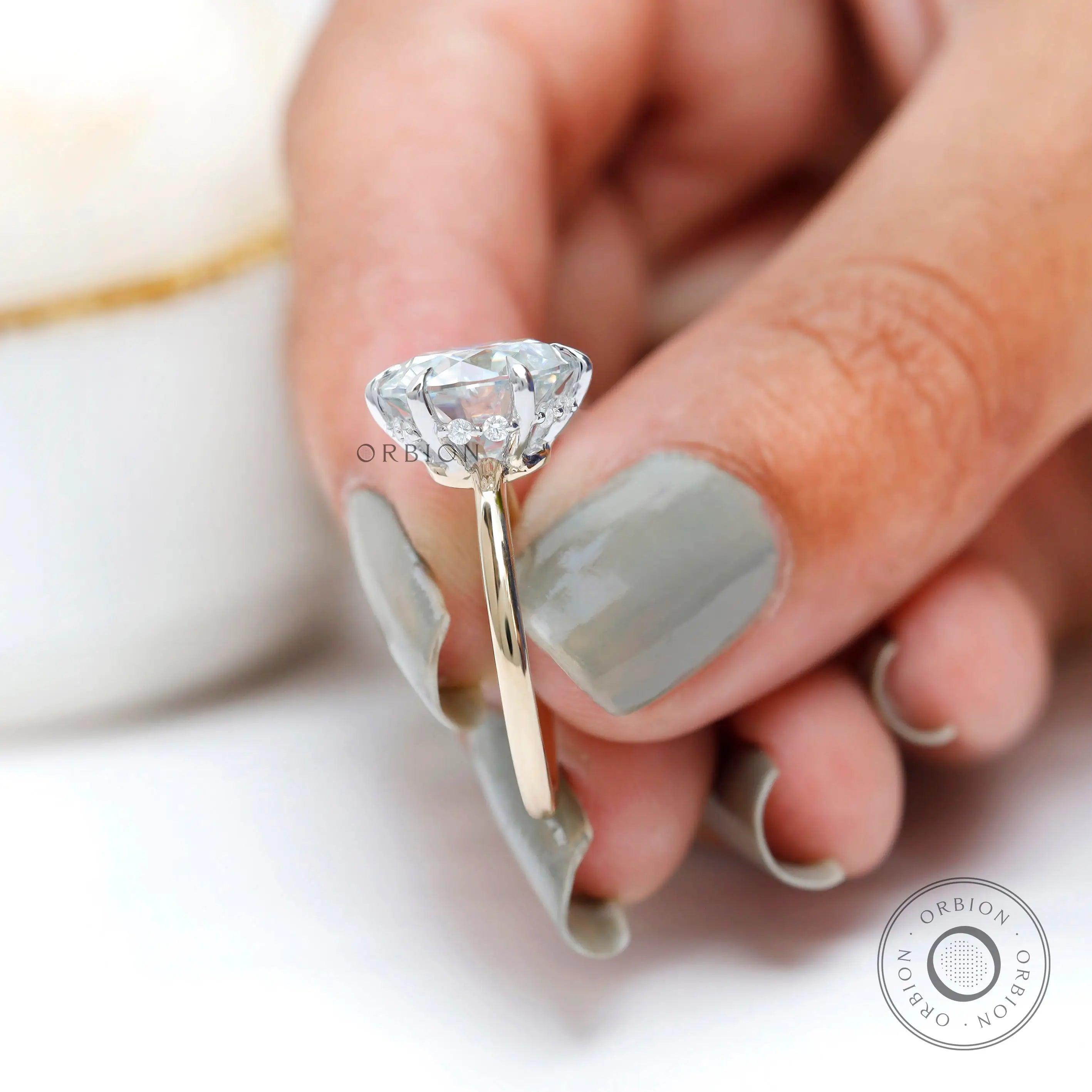 Top view round brilliant moissanite solitaire ring