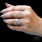 Angled on-hand view polished gold solitaire ring