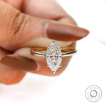 Close up tulip setting marquise engagement ring