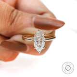 Close up tulip setting marquise engagement ring