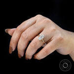 Close up marquise lab diamond engagement ring on fingure