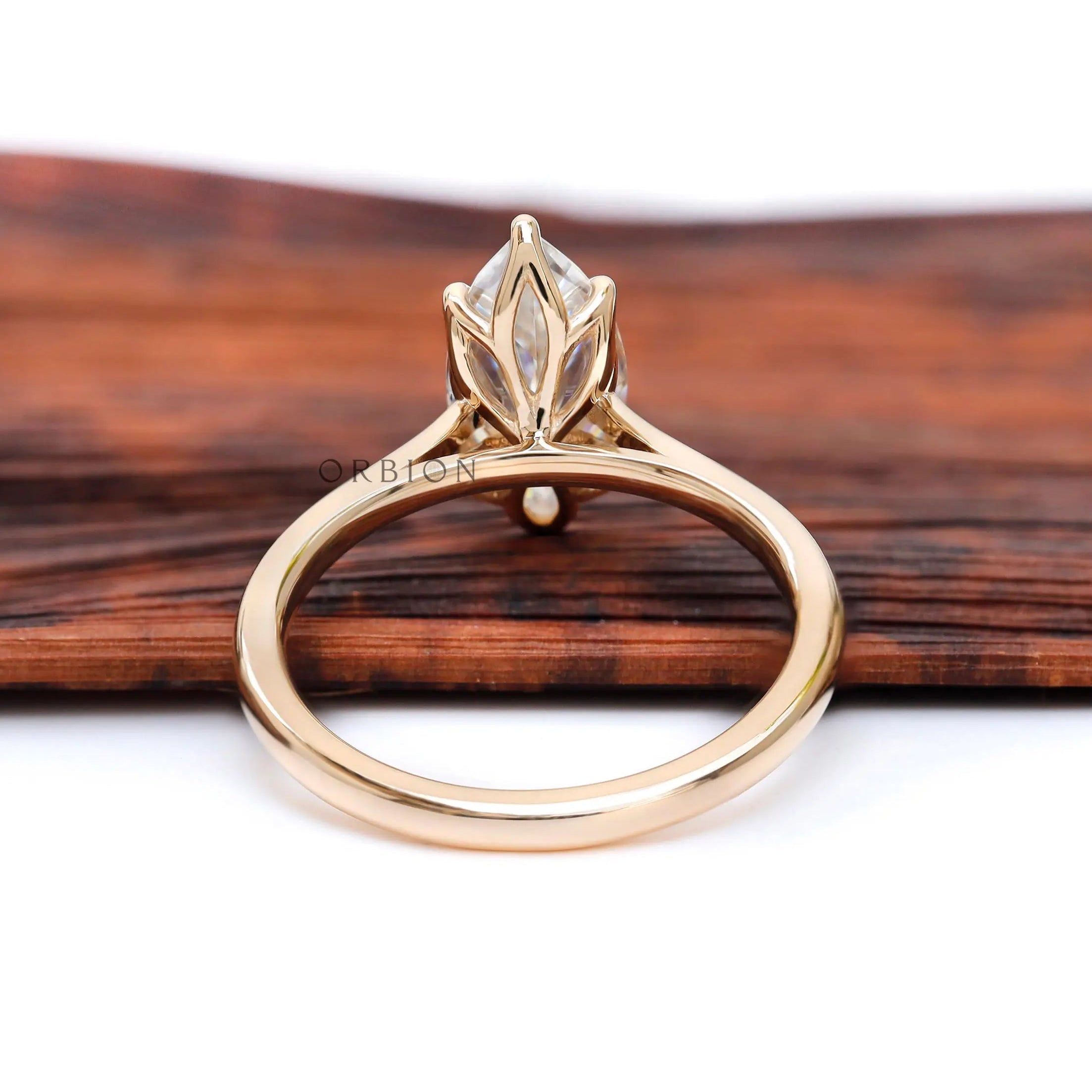 Tulip setting marquise cut engagement ring back side