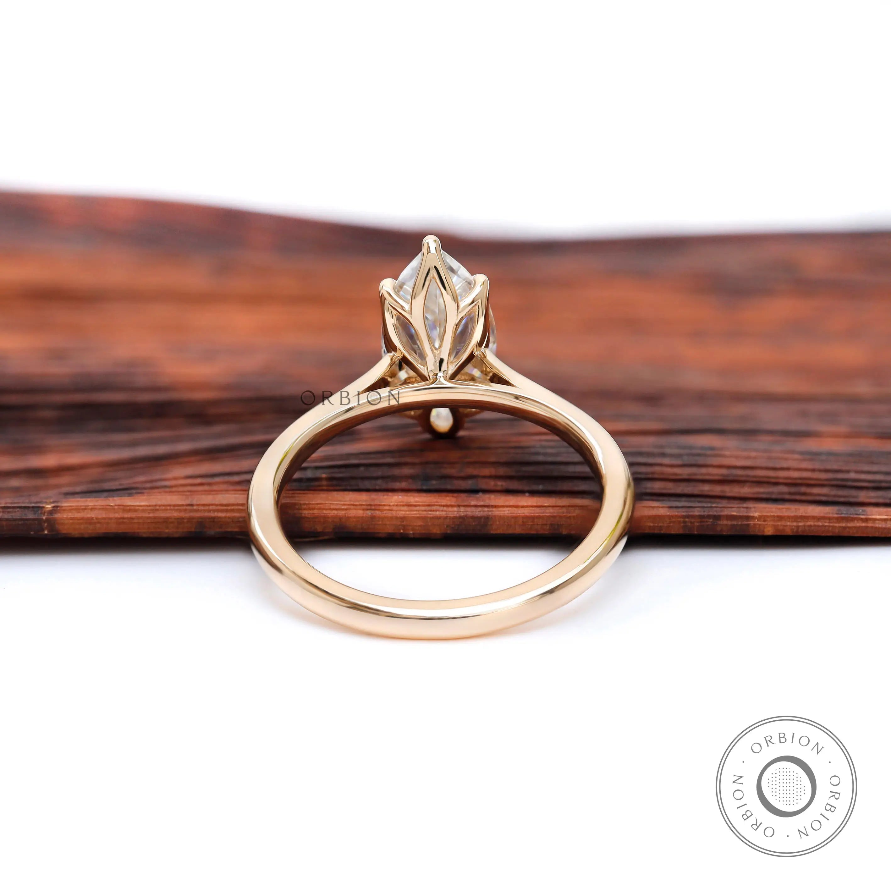 Tulip setting marquise cut engagement ring back side