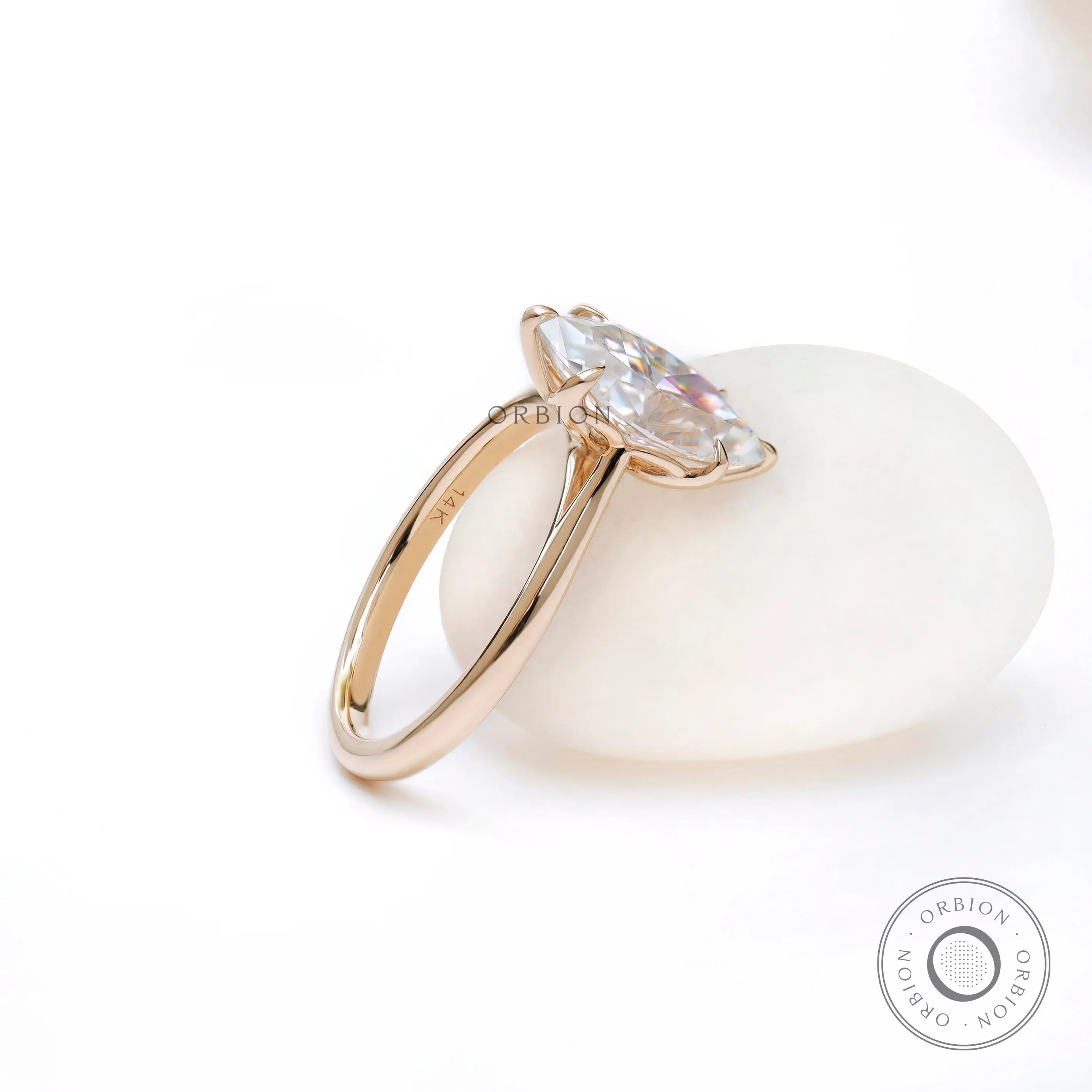 Minimal marquise cut engagement ring glossy finish