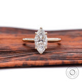 Marquise cut moissanite solitaire engagement ring in 14K yellow gold