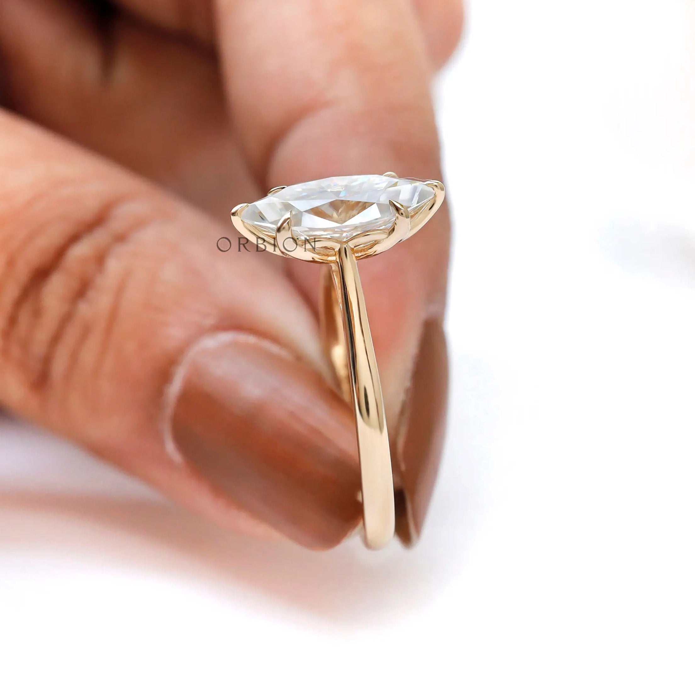 Yellow gold marquise engagement ring handcrafted setting