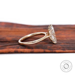 Marquise solitaire ring elevated tulip setting detail