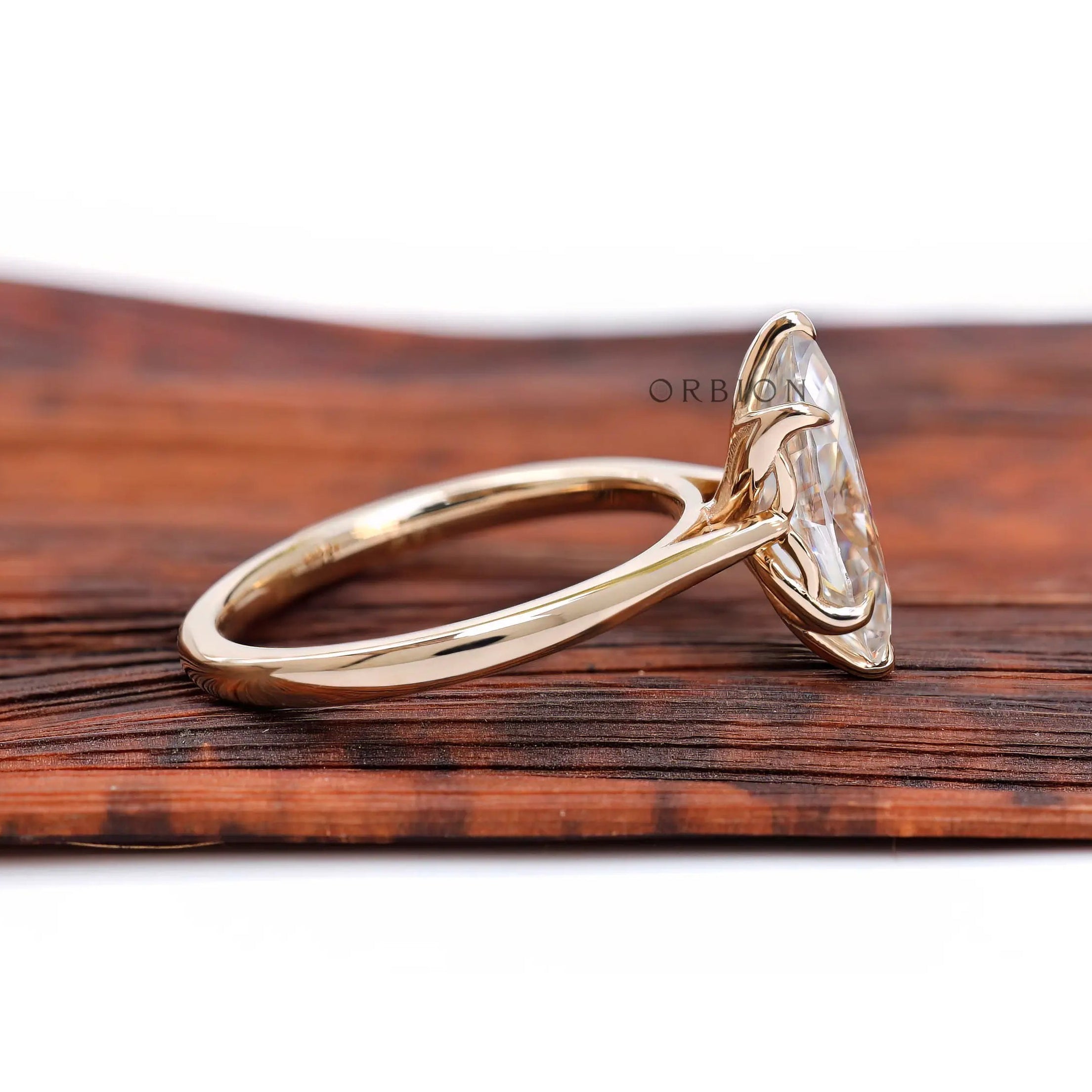Marquise solitaire ring elevated tulip setting detail