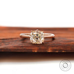 Elongated cushion Old Mine Cut moissanite solitaire ring in 14K rose gold front view