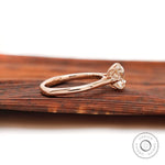 Side profile of elongated cushion moissanite six prong ring