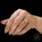 Elegant elongated cushion engagement ring finger coverage view