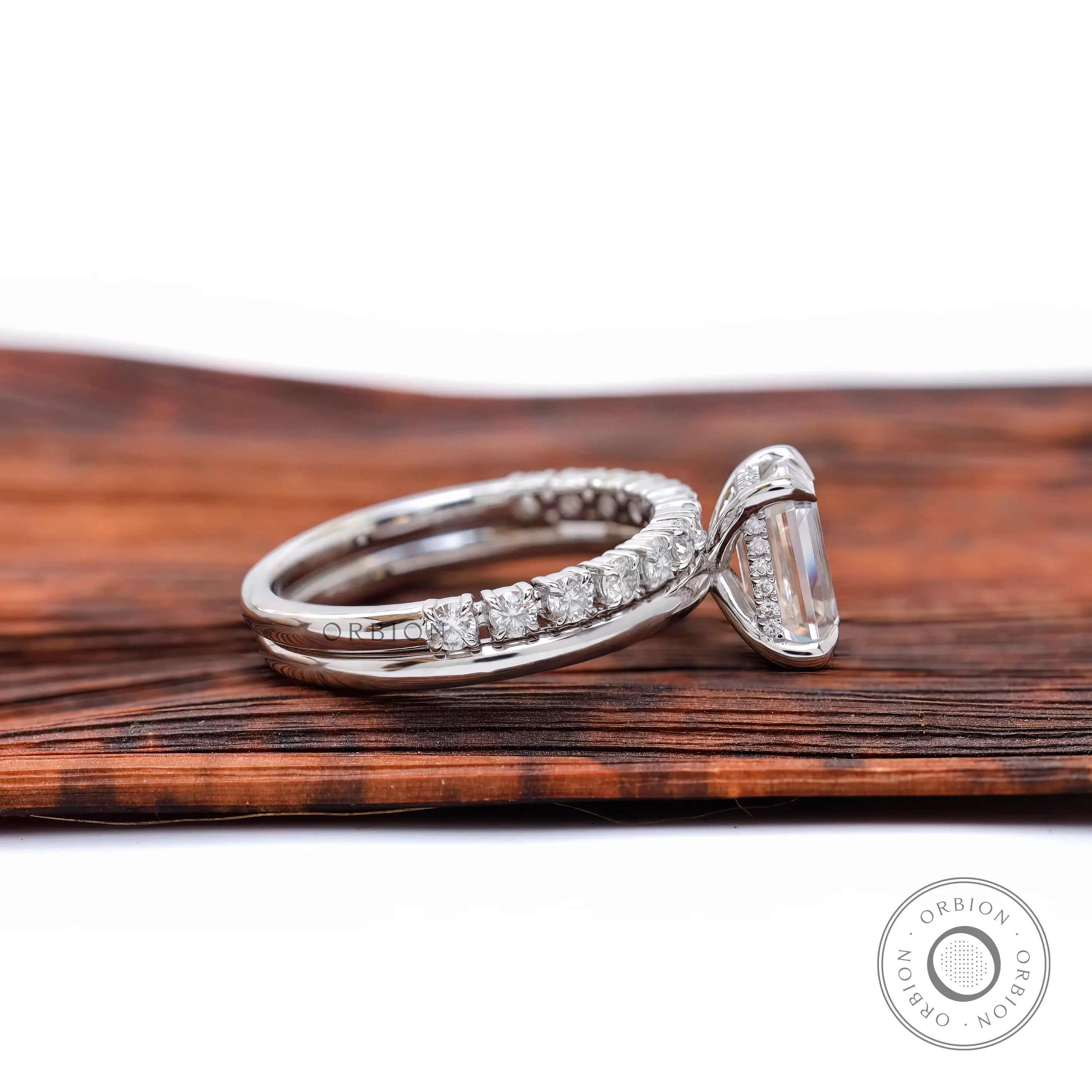 Side profile showing hidden halo detail under center stone