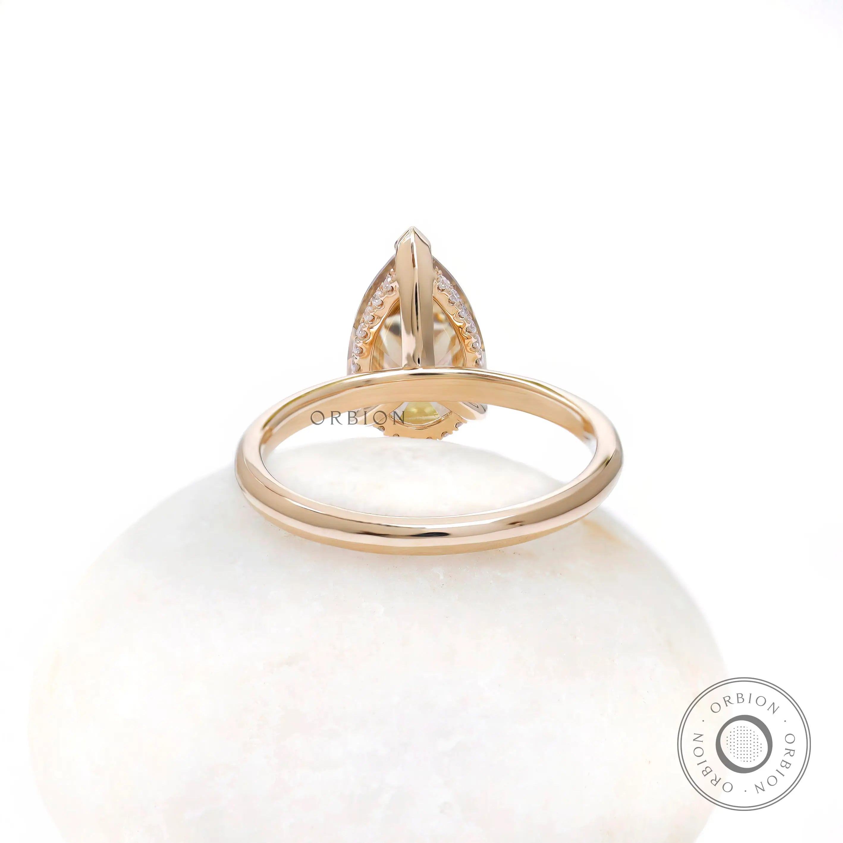 Back view of pear solitaire hidden halo ring