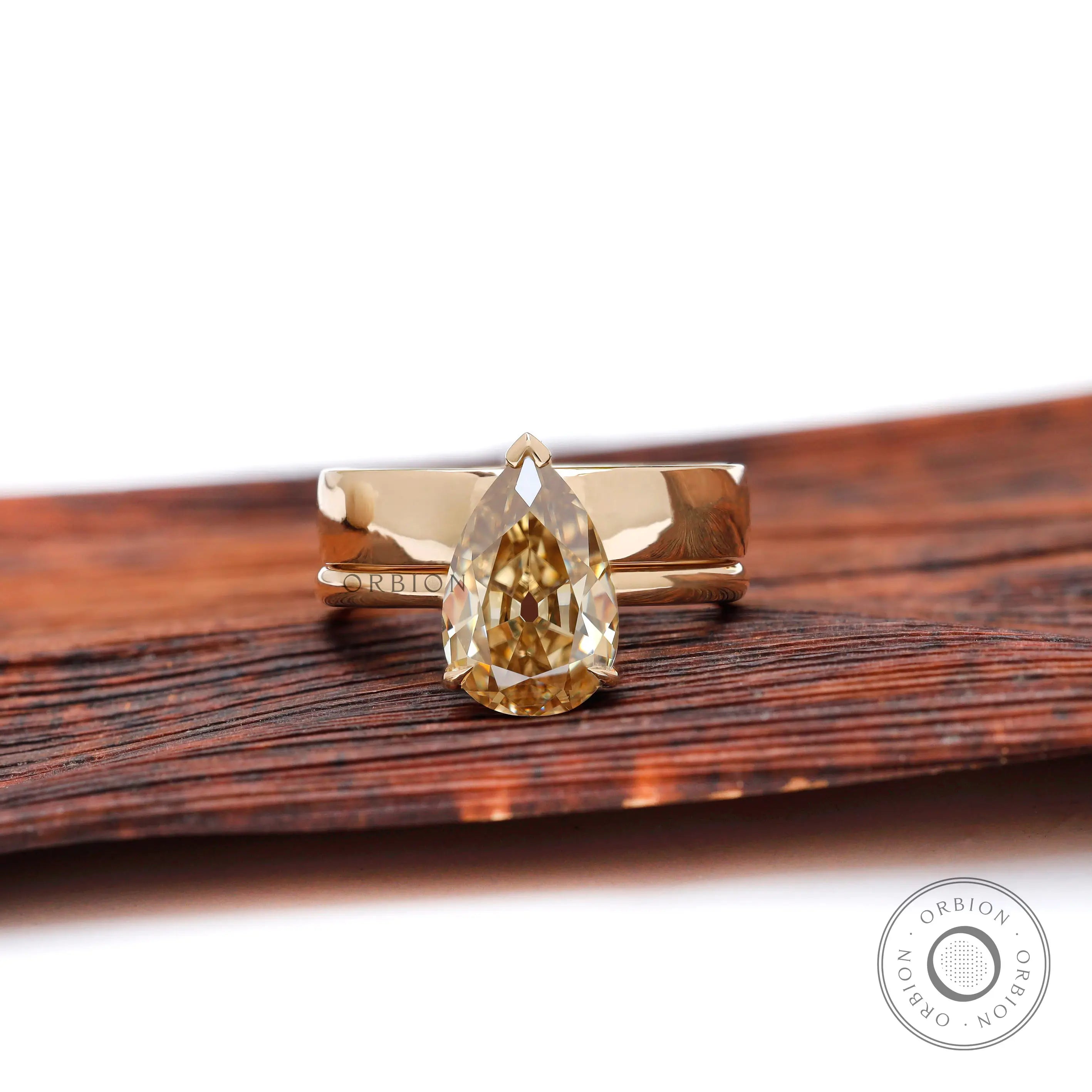 Pear Old Mine Cut champagne moissanite solitaire ring front view