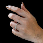 On-hand view of 7 moissanite vintage stacking wedding band in yellow gold