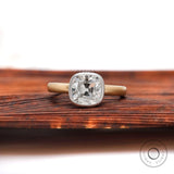 Dual tone cushion Old Mine Cut moissanite bezel solitaire ring