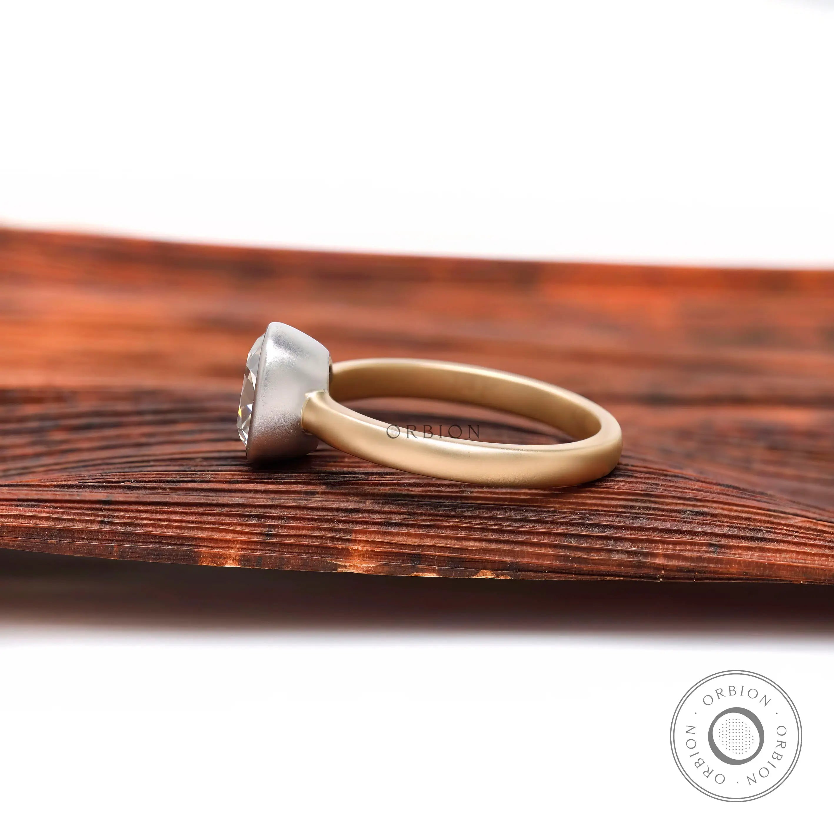 Dual tone gold solitaire ring side profile