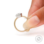 Yellow and white gold cushion bezel ring close up