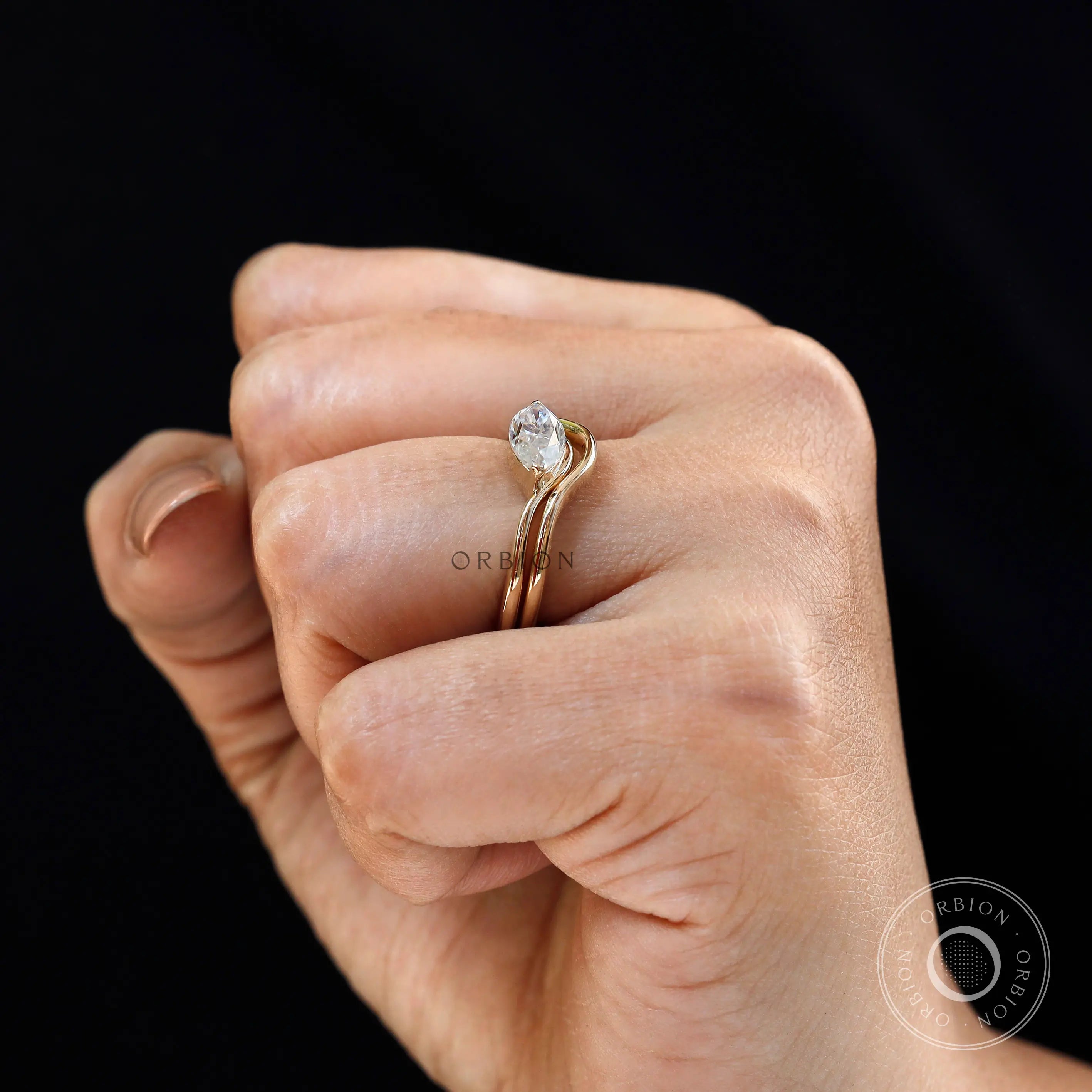 Wave design solitaire engagement ring set side angle