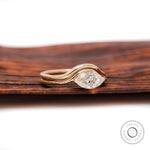 Wave band marquise cut moissanite ring side view