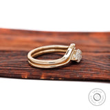 Low profile marquise solitaire ring in 10K yellow gold side view