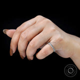 Glossy 3 mm twisted gold band close up
