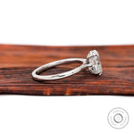 Side profile showing cathedral shoulders and hidden halo diamond setting