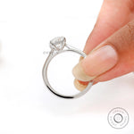 Minimal oval diamond ring in white gold with elevated cathedral design