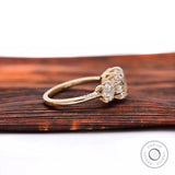 Side profile showing vintage crown prongs in yellow gold.
