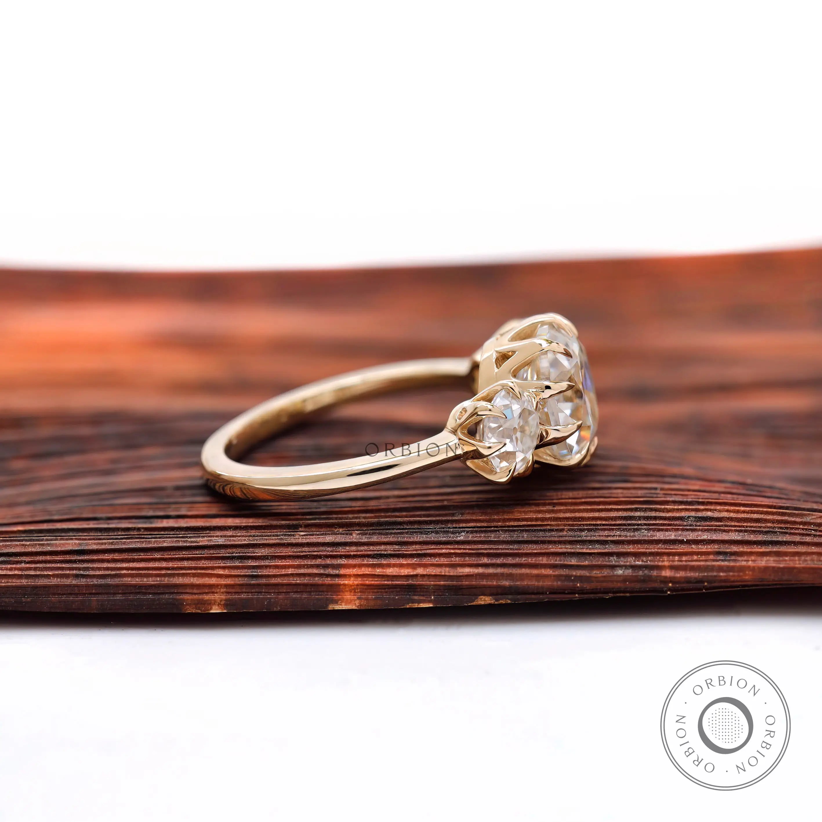 Side profile showing vintage crown prongs in yellow gold.