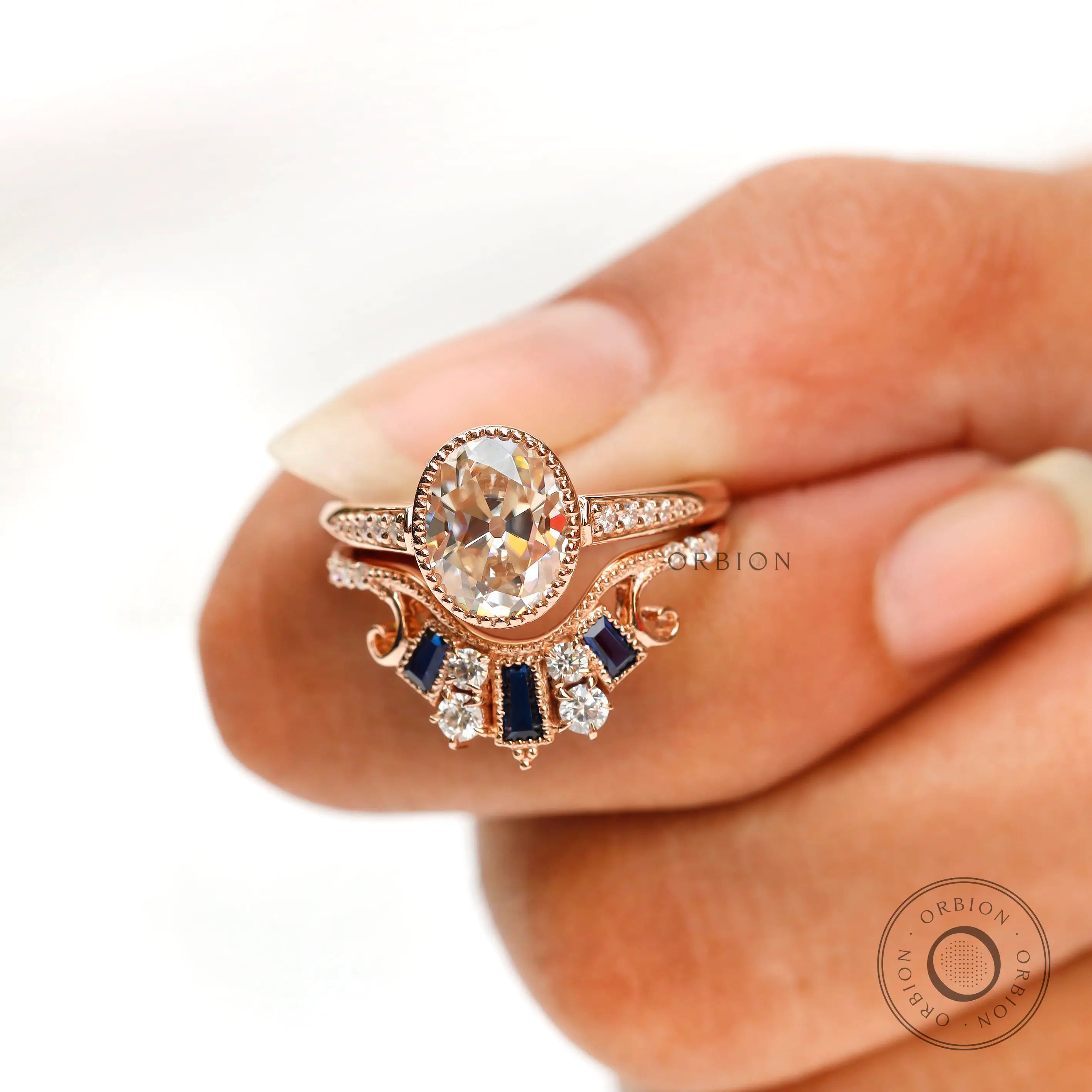 Vintage halo moissanite ring with blue baguette accent stones