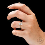 Minimalist trilogy oval ring with kite diamond accents