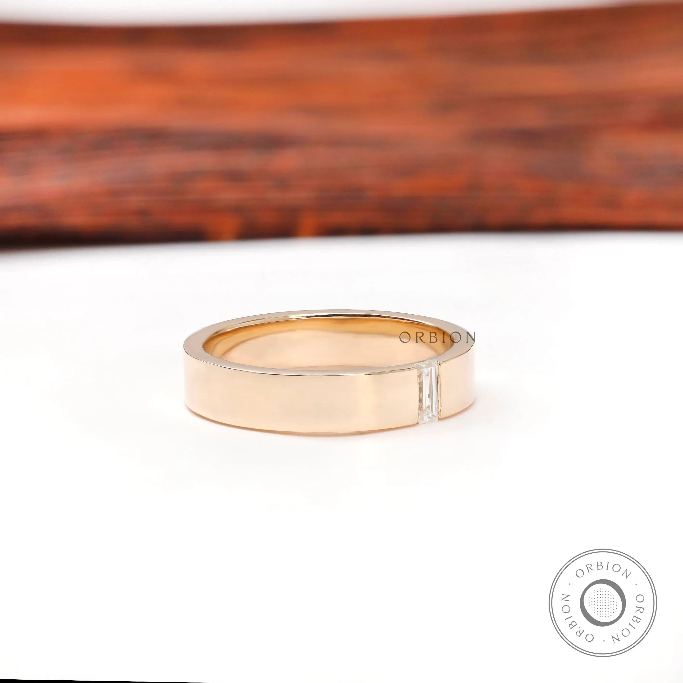 Angled view of polished comfort fit band highlighting the flush setting.