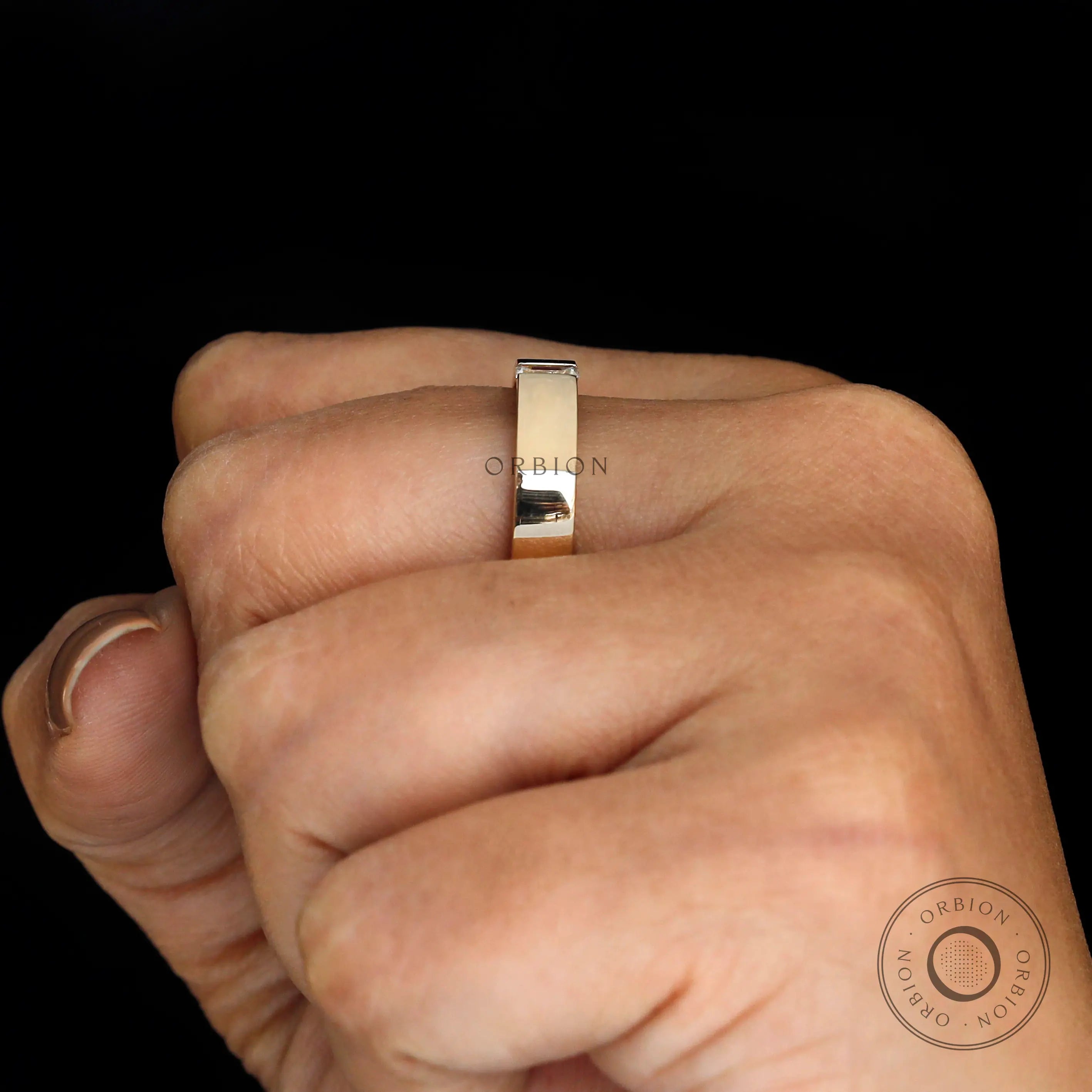 Side view of the polished cigar band on hand, showing smooth edges and comfort fit profile.