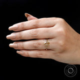 Oval brown moissanite ring minimal gold setting on fingure