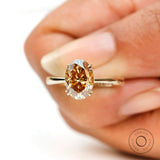 Cocktail style oval champagne moissanite solitaire ring