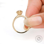 Large oval moissanite ring dark champagne color front view
