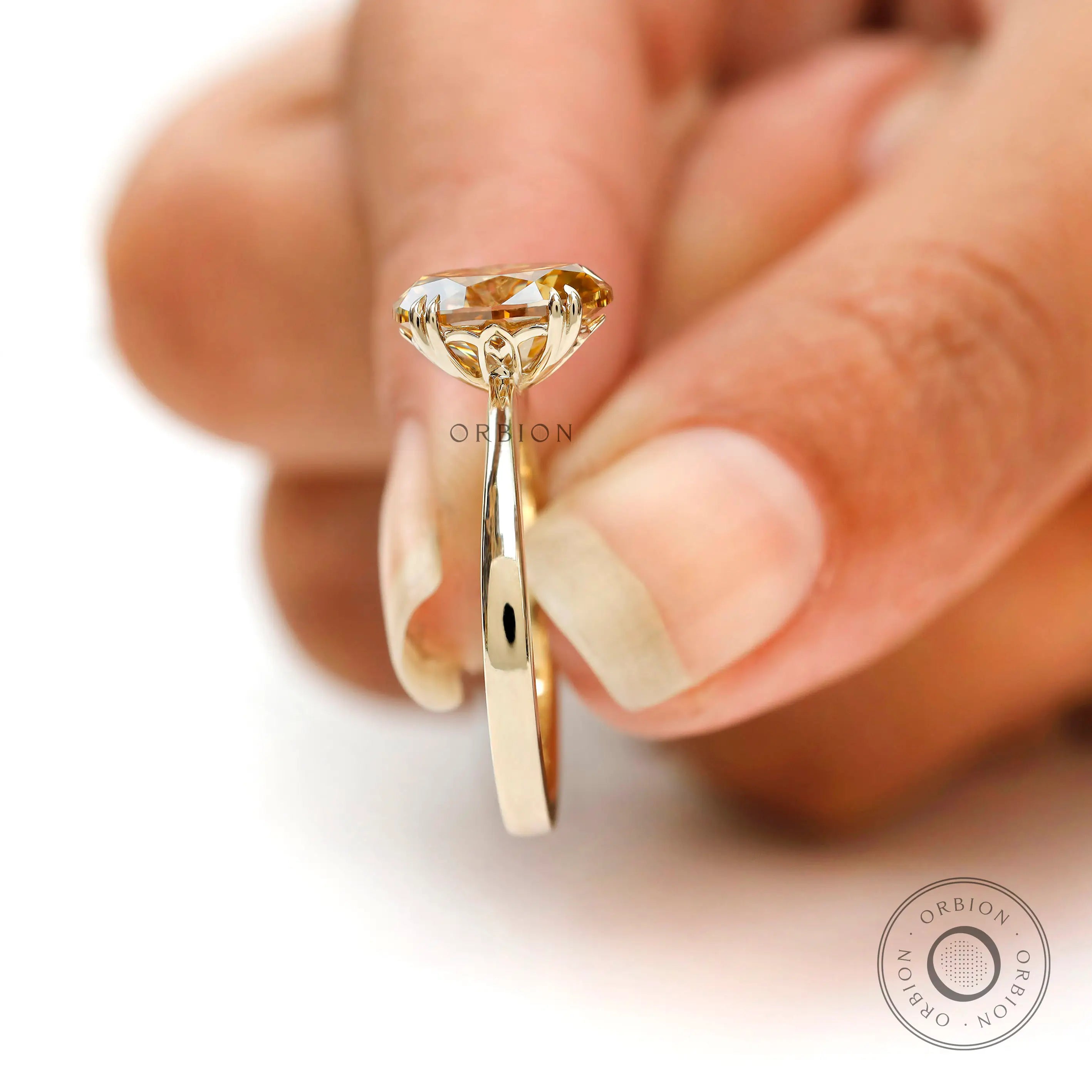 Statement oval champagne moissanite ring yellow gold band