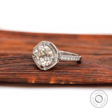 Side profile of OEC moissanite engagement ring white gold