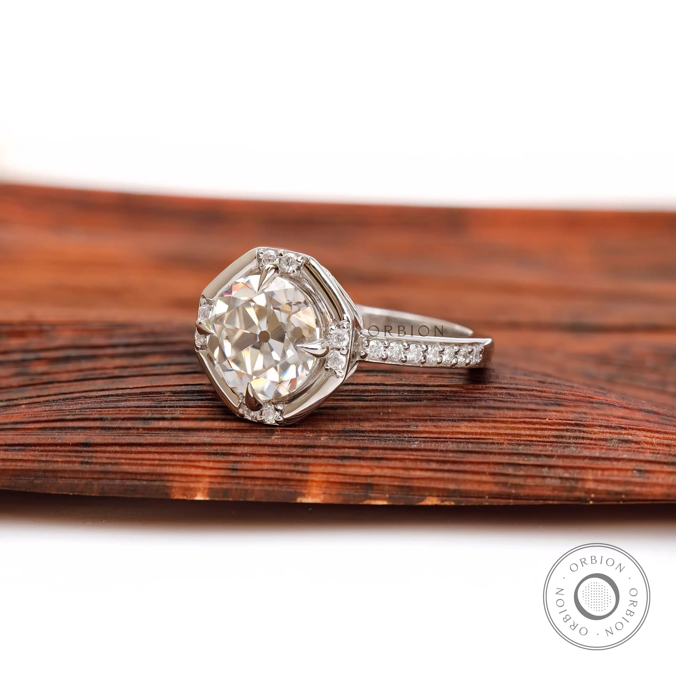 Side profile of OEC moissanite engagement ring white gold