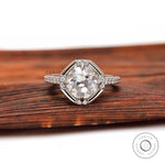 Round Old European cut moissanite engagement ring in white gold