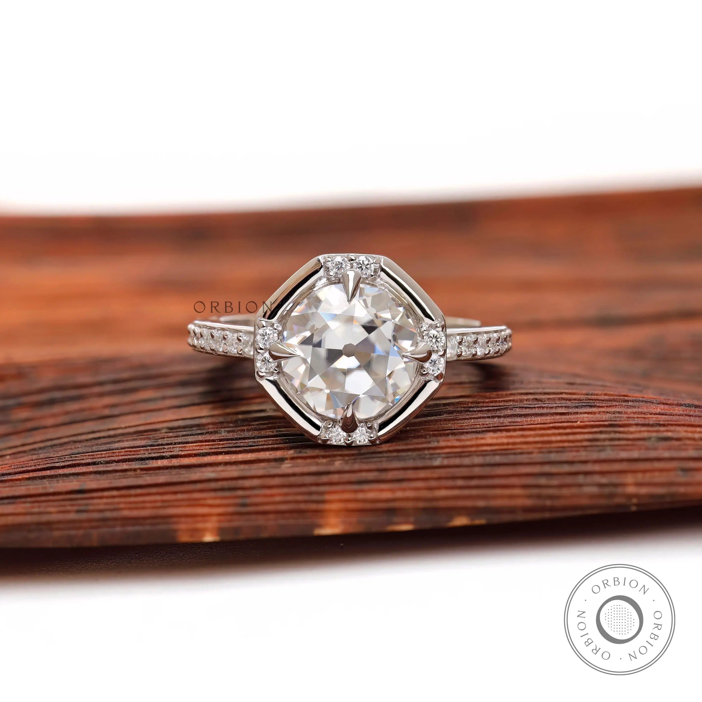 Round Old European cut moissanite engagement ring in white gold