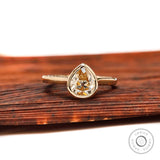 Pear Old Mine Cut light champagne moissanite bezel solitaire ring