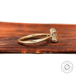 Side profile showing cathedral shoulders and raised solitaire setting